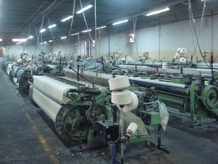 Weaving shed with looms running at Shree Nakoda Impex, Bhilwara